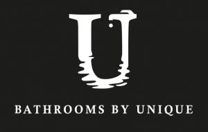 This image is of our Bathrooms by Unique logo, it is sleek in design, it has a black background with a large white "U" in the middle which has a ripple effect at the bottom part of the "U" with Bathrooms by Unique written in white below it. This is to showcase our bathroom brand logo.